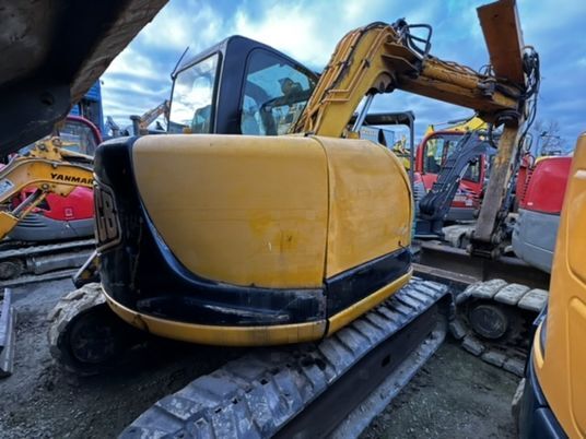 mini-pelle JCB JZ70 - Double déport de bras